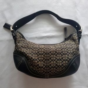 Black and Tan medium size Coach purse